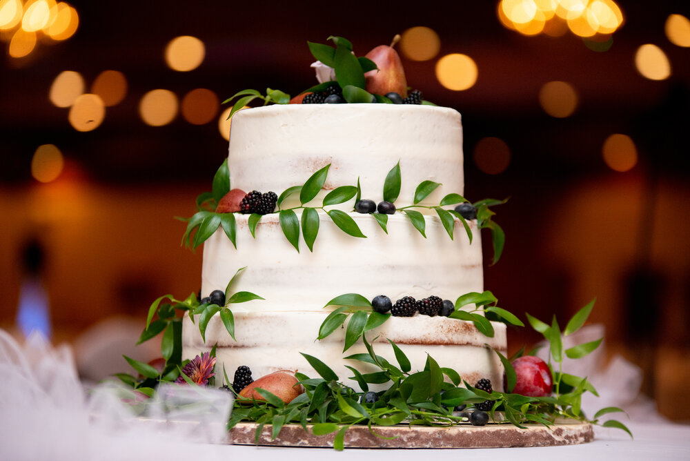 7:30 PM: Cake Cutting - Pro Tip: If you plan on shoving cake in each-others faces, cut the cake after your golden hour portraits so cleanup time doesn’t cut into the best photo lighting of the day!